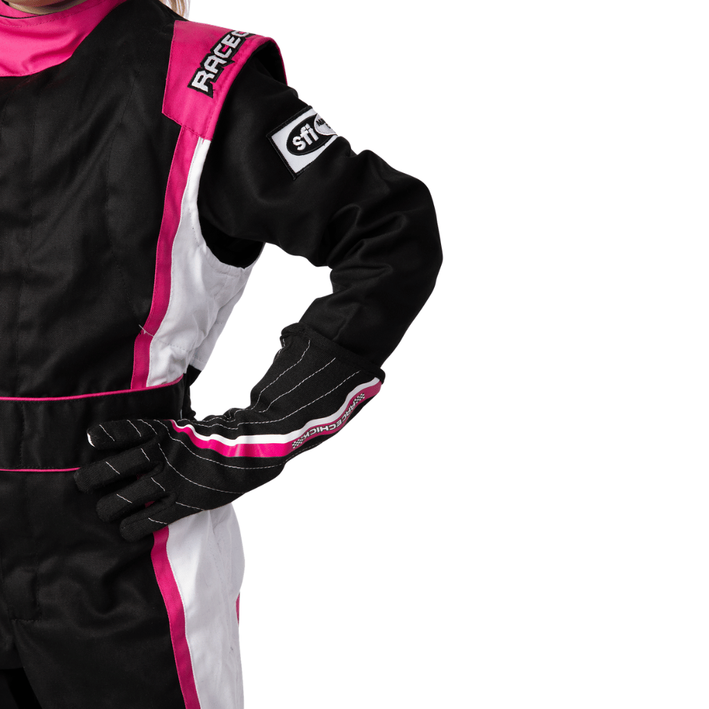 Girl wearing race suit and gloves