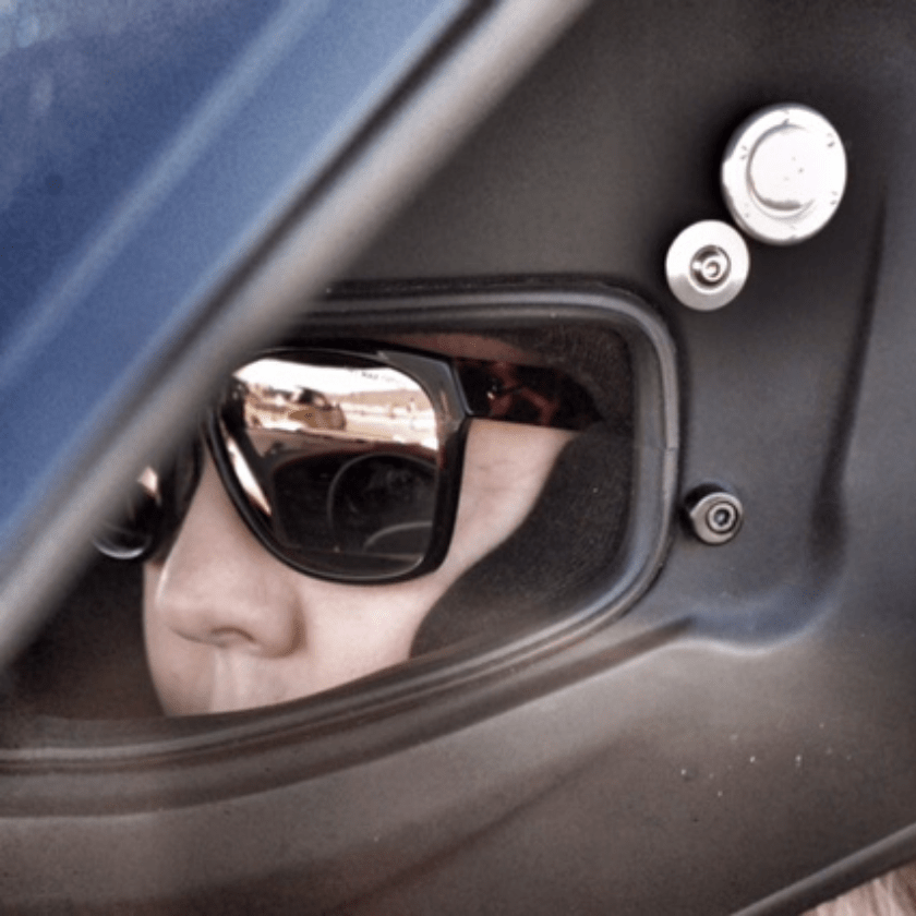 Person with sunglasses in a black helmet - Untitled design 15