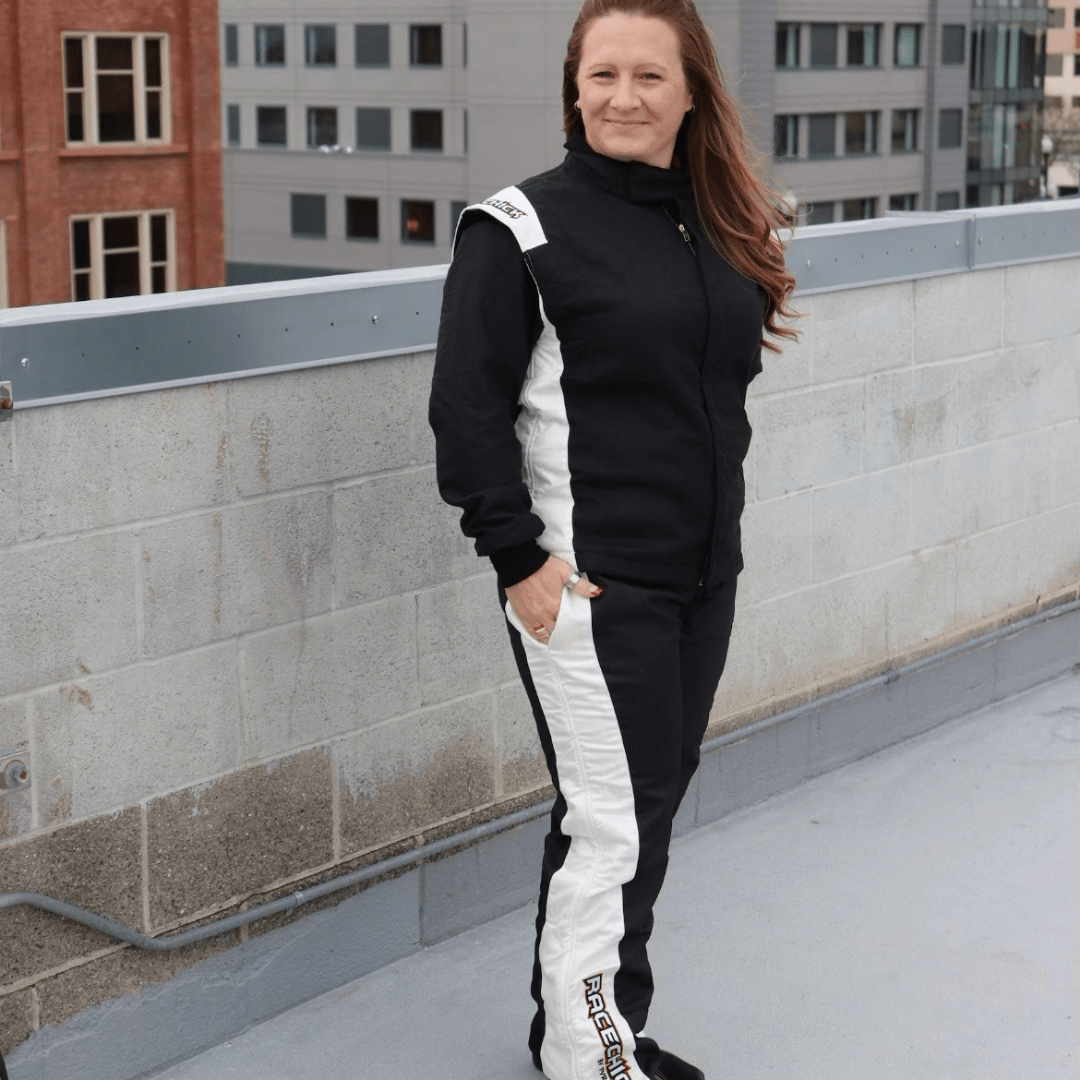 Woman in racing suit on rooftop