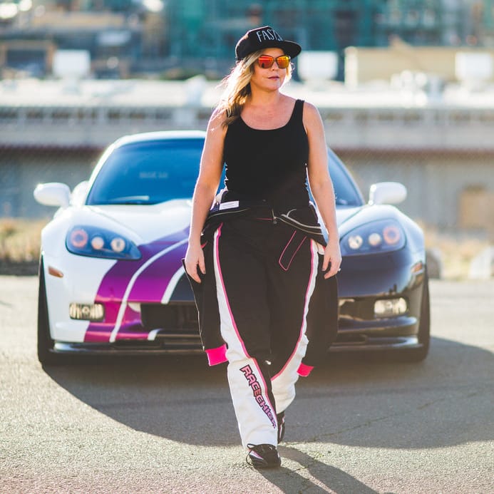 Racechick founder walking in front of her car