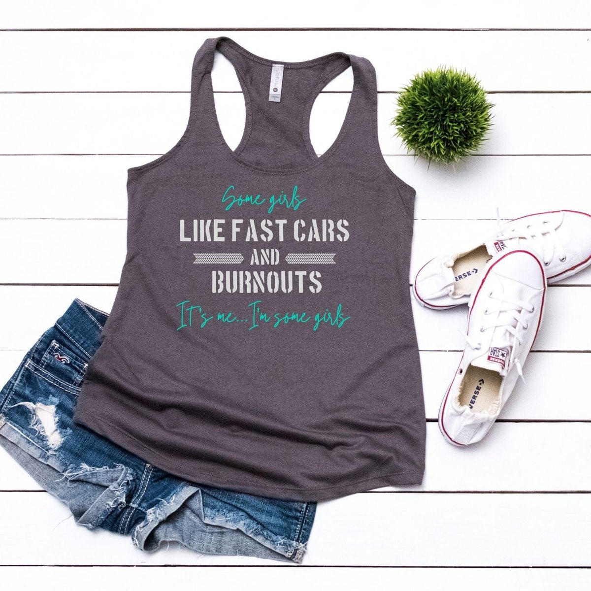Some girls like fast cars and burnouts tank top with shorts and shoes